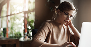 Female student working on a laptop